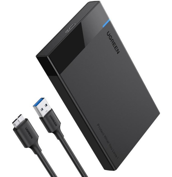 Boîtier externe Ugreen USB 3.0 posé sur un bureau moderne