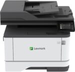 Imprimante Laser Monochrome Lexmark sur un bureau moderne avec documents en cours d’impression.