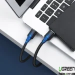 Câble USB 2.0 UGREEN 10310 et 10311 branché sur ordinateur portable USB-A